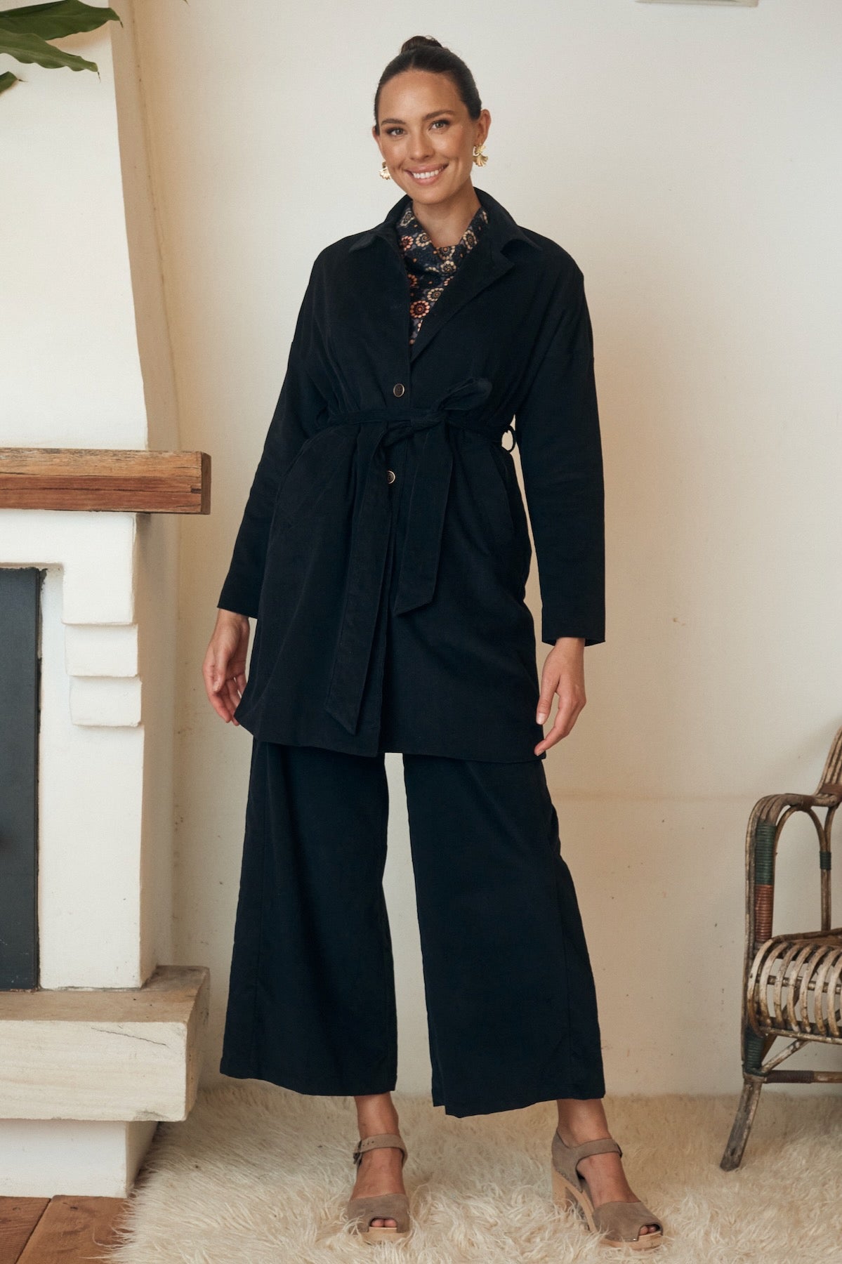 A casual yet stylish dress photographed in natural light, highlighting its relaxed fit and organic fabric texture.