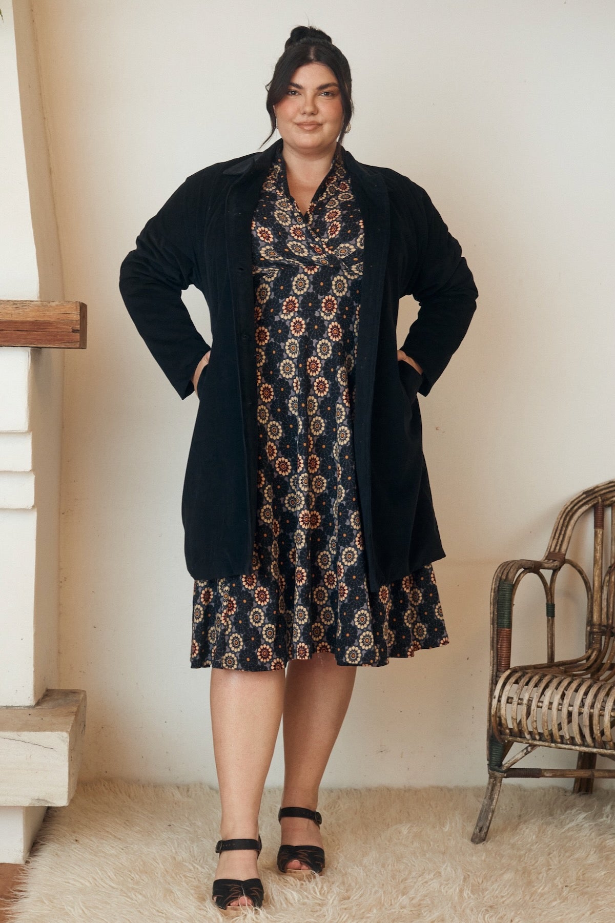 A beautiful, understated top, its soft, organic fabric draped elegantly on a mannequin.