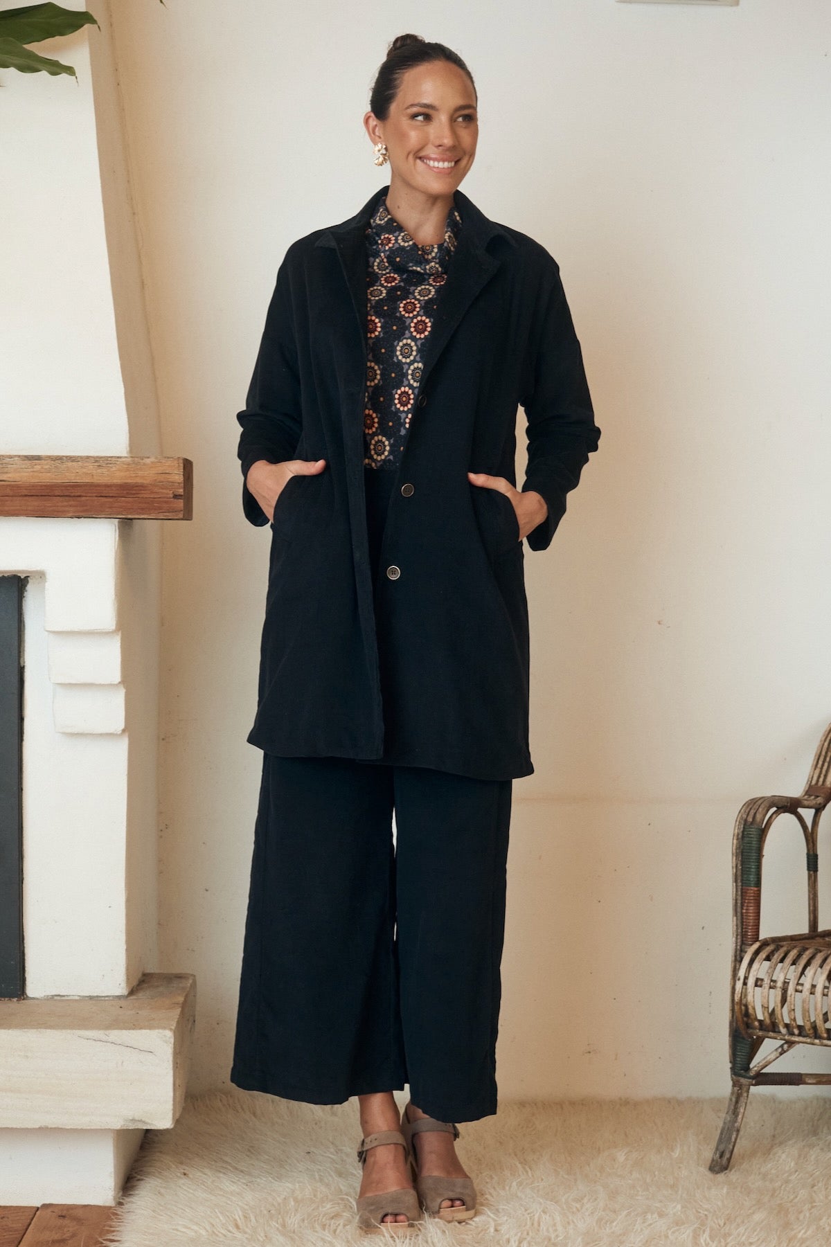 A light, summery dress displayed in a soft, natural light, with its simple yet elegant design standing out effortlessly.