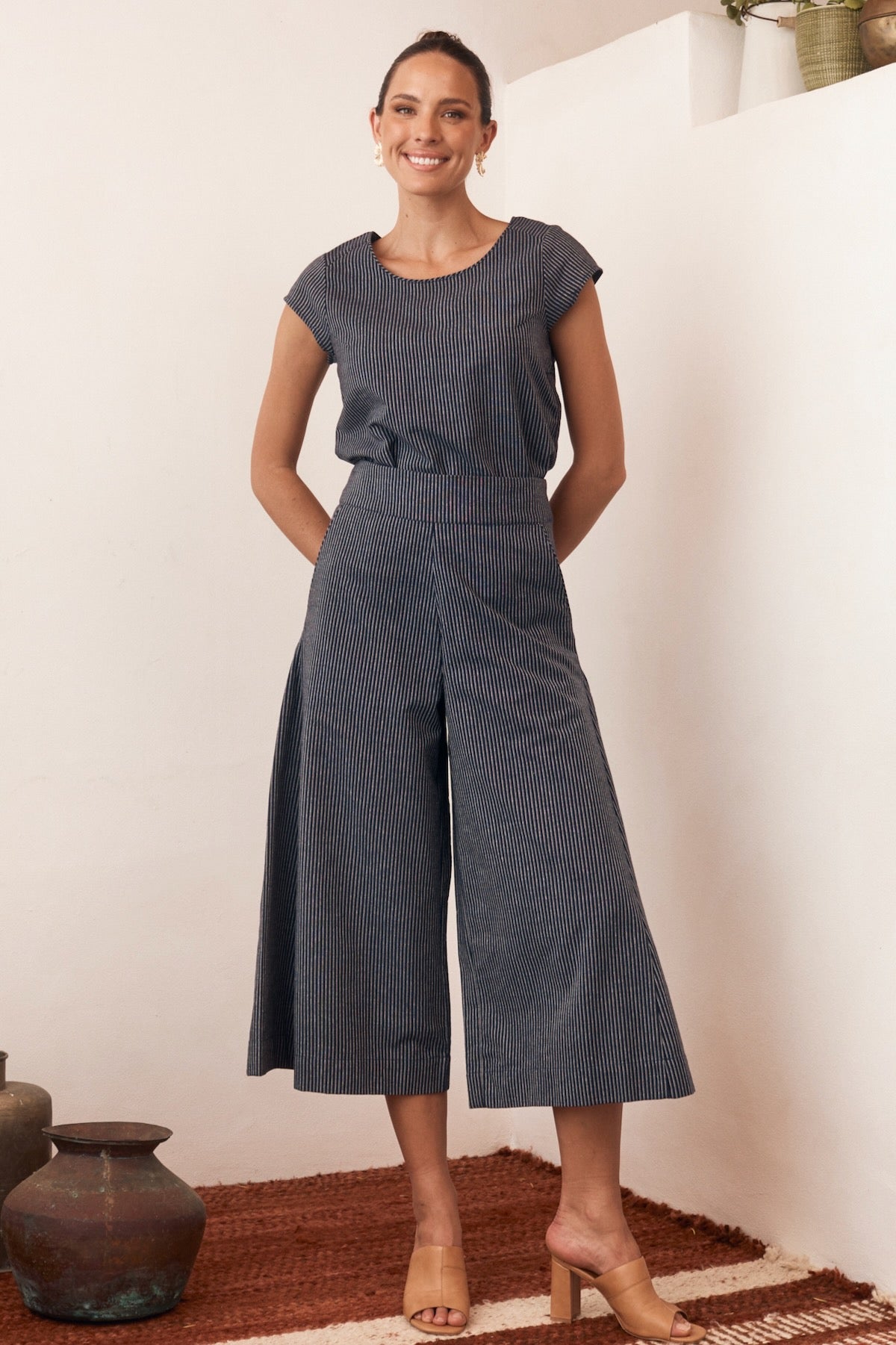 Close-up of a buttoned-down collar dress with a floral print.