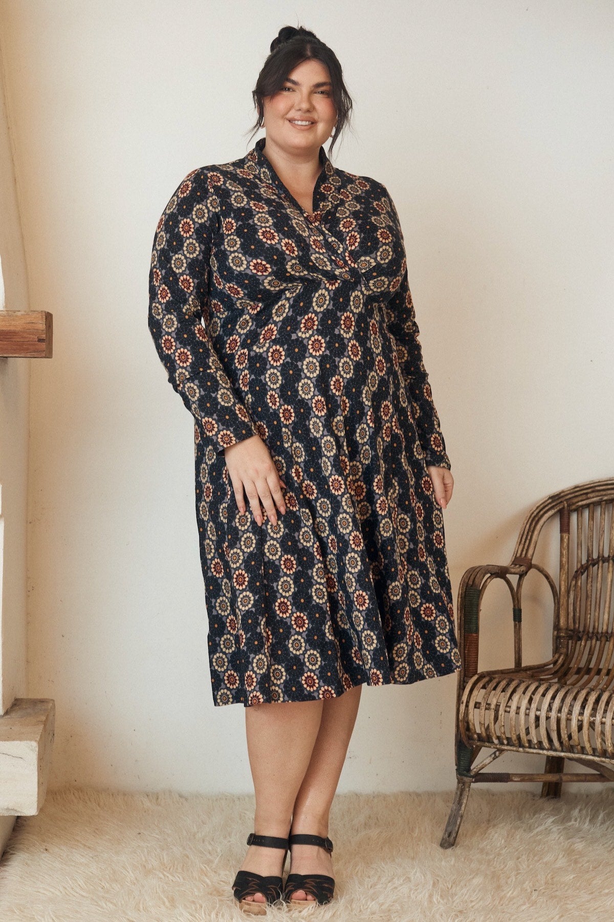 A close-up of a beautifully intricate fabric detail, showcasing its rich texture and elegant patterns in soft lighting.