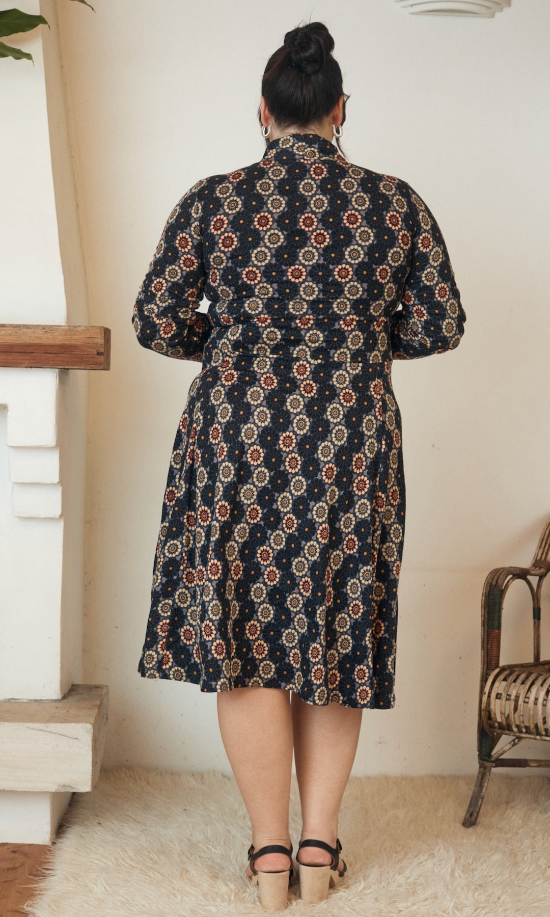 A stunning piece of clothing hanging gracefully, exuding effortless style and natural elegance.