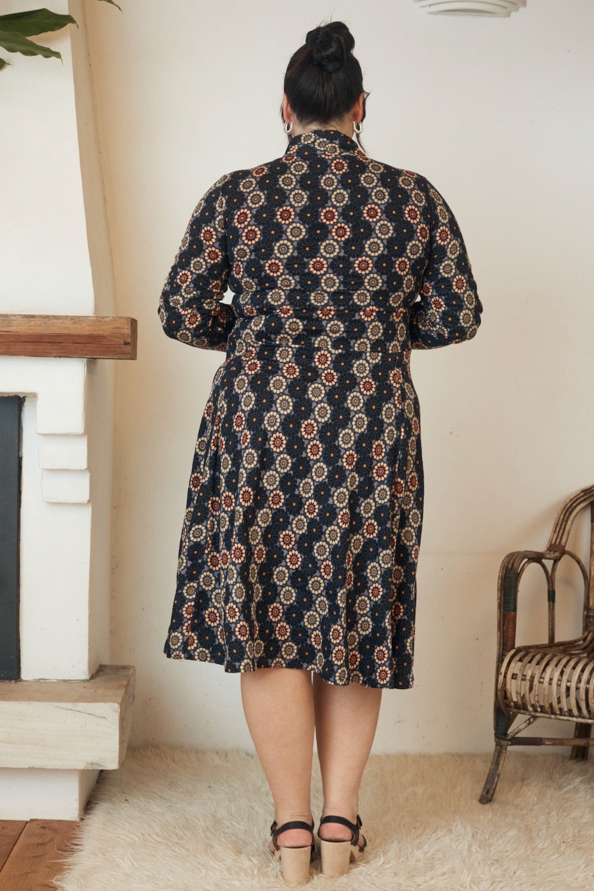 A stunning piece of clothing hanging gracefully, exuding effortless style and natural elegance.