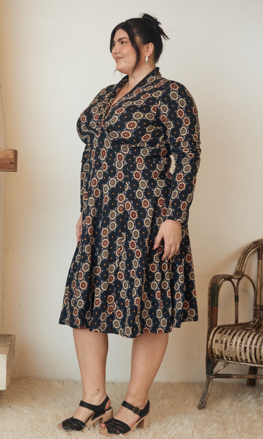 Close-up of a floral print fabric, displayed on a dress.