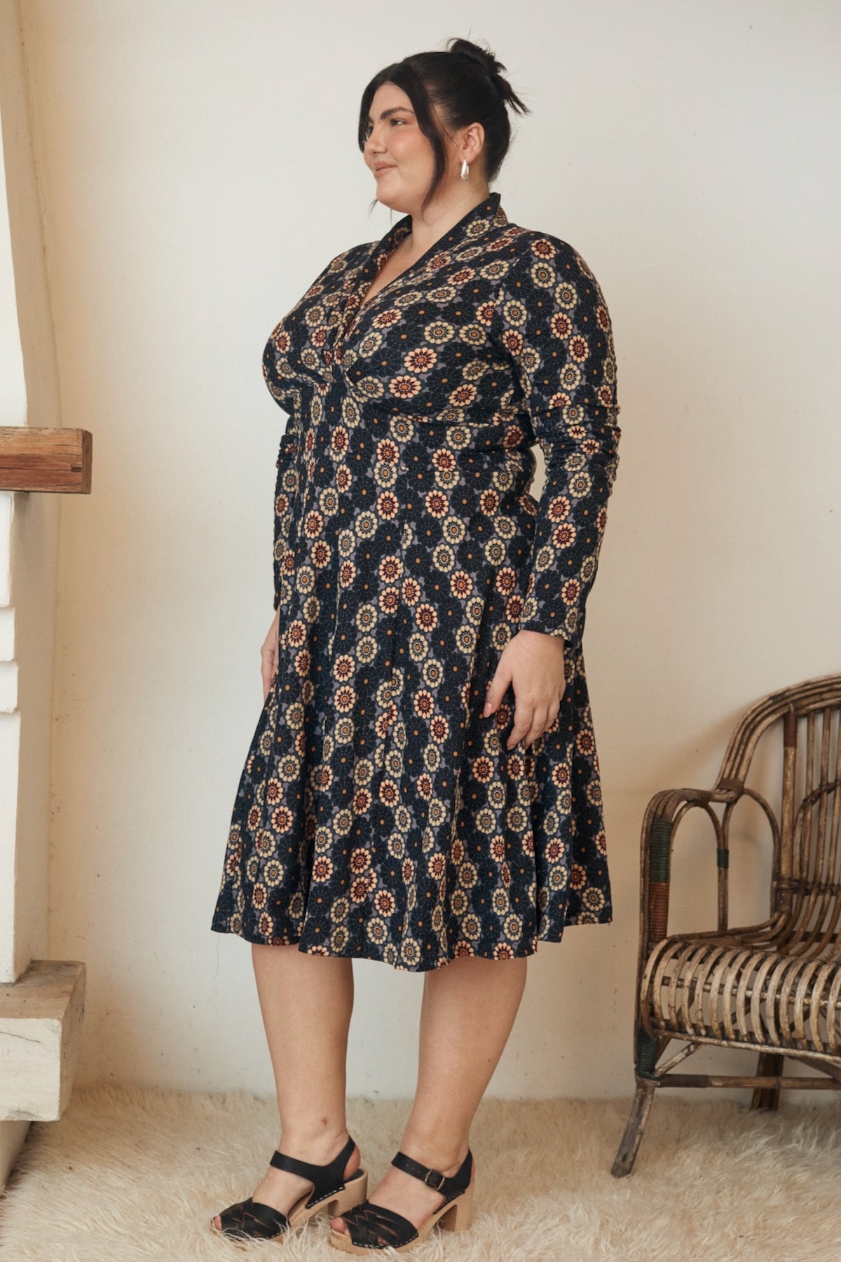 Close-up of a floral print fabric, displayed on a dress.