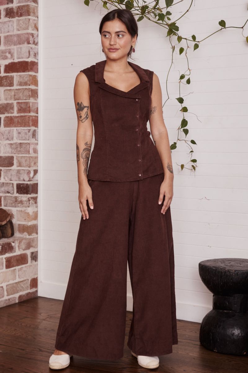 A beautifully intricate fabric displayed in soft, natural light, showcasing the fine details and craftsmanship.