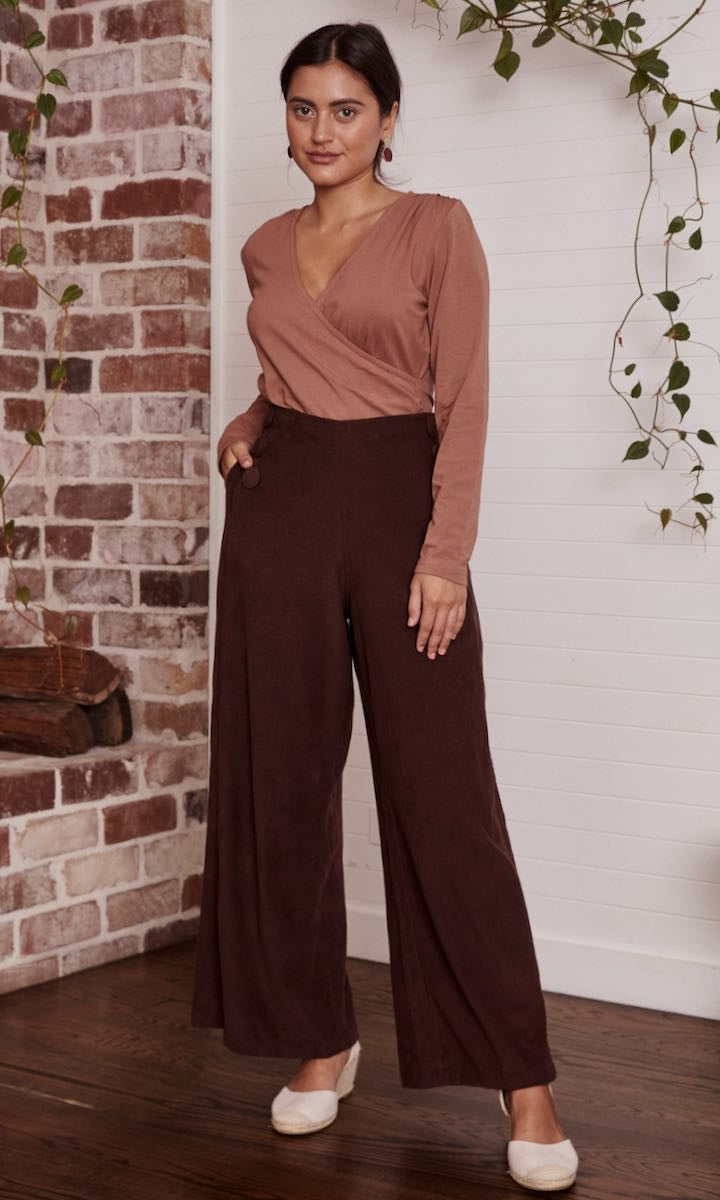 A cozy, casual dress displayed against a neutral background, its natural texture and simplicity standing out.