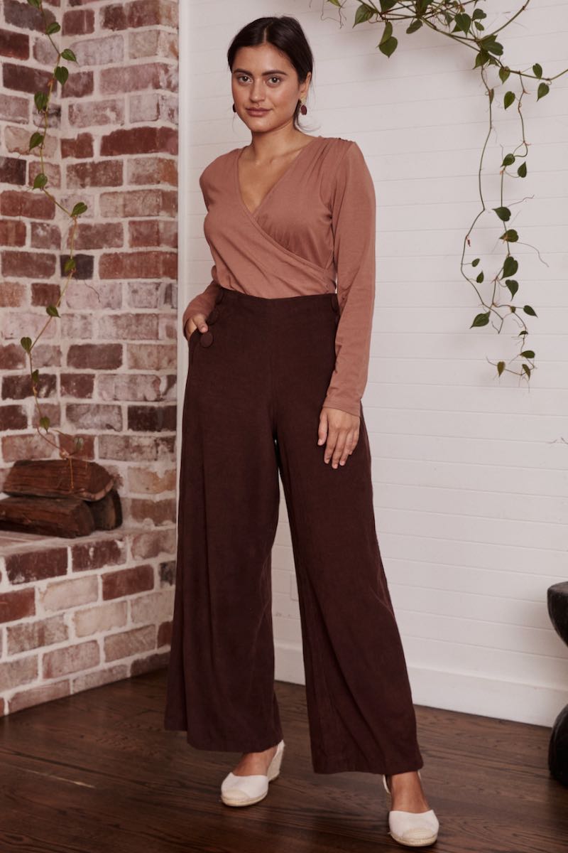 A cozy, casual dress displayed against a neutral background, its natural texture and simplicity standing out.