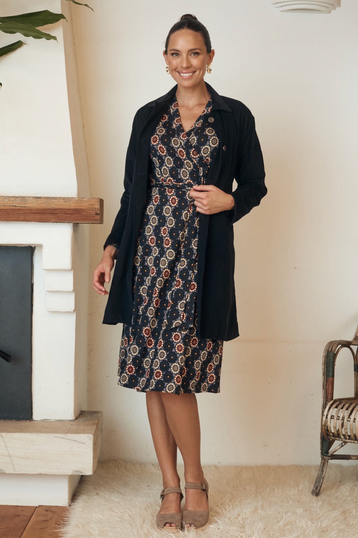 A chic, comfortable dress with simple lines and organic details, perfect for a relaxed, casual look.