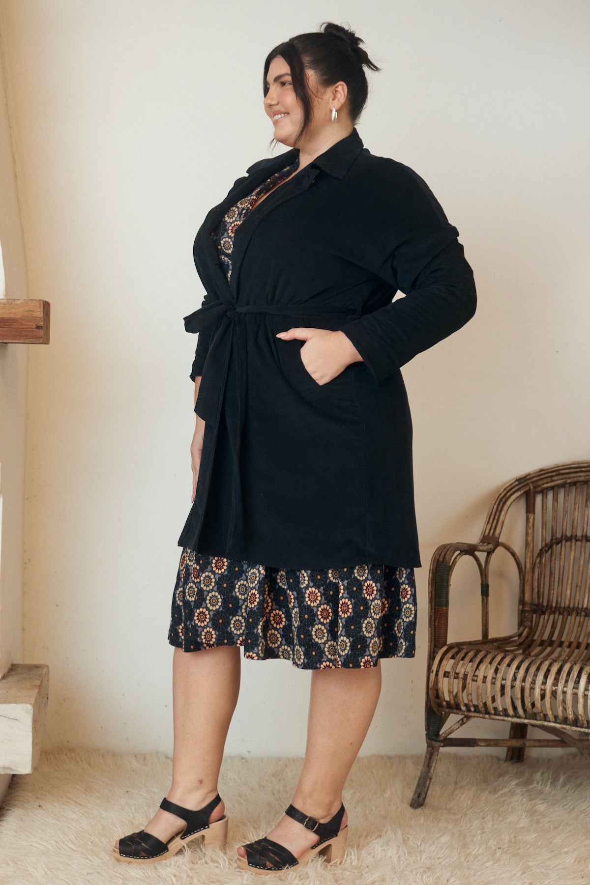 A gorgeously textured fabric, with intricate details catching the light, evoking feelings of warmth and comfort.