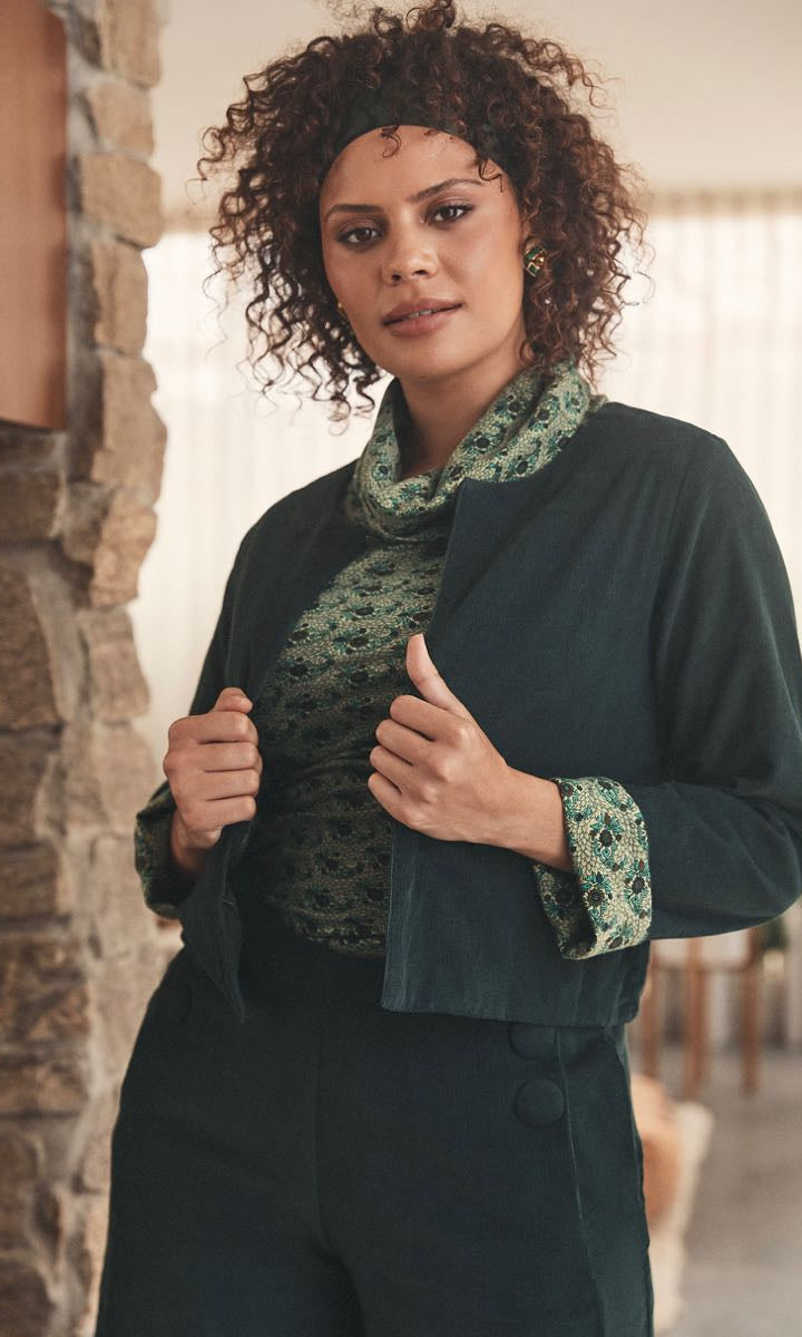 A beautifully intricate fabric swatch, showcasing the fine details and craftsmanship of the material.